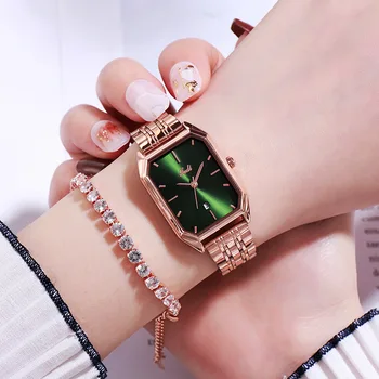 Nueva versión coreana de la sólida banda de acero de la moda señoras reloj de moda casual de todos coinciden calendario impermeable reloj de cuarzo